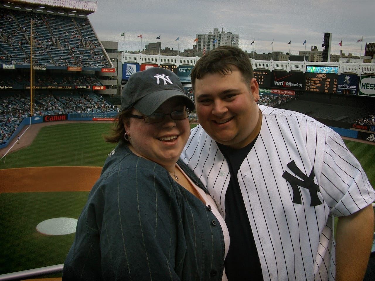 Ali and I standing in the top level of Yankee Stadium. You can see the field behind us.