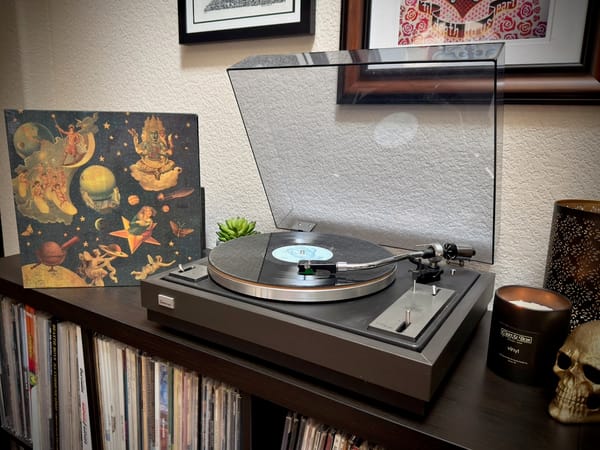 Mellon Collie and the Infinite Sadness by The Smashing Pumpkins playing on a record player.